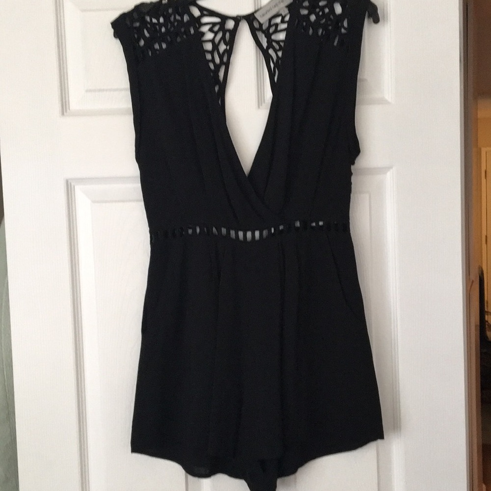 CUTEST black romper with open back!